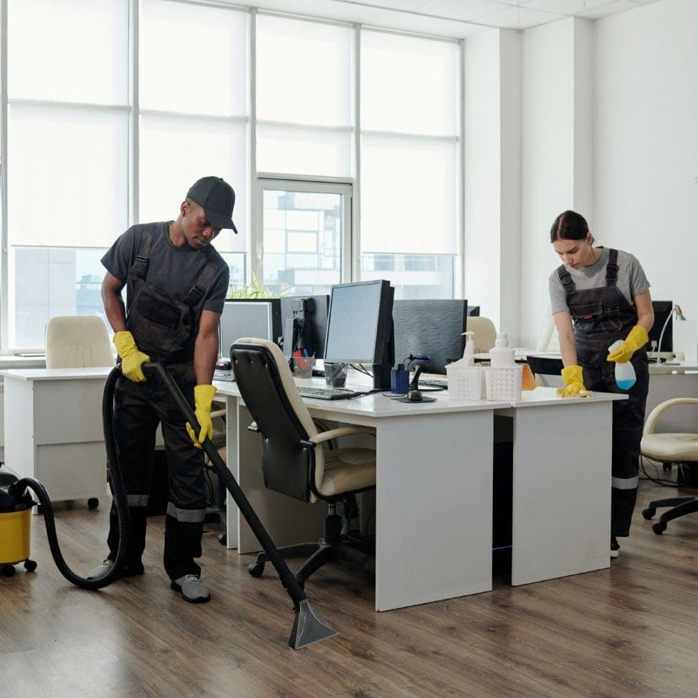 Professional maid service cleaning a luxury kitchen in Naperville, IL using green products.
